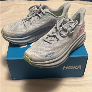 Hoka Women's Light Gray Running Shoes with Blue & Lime Accents
